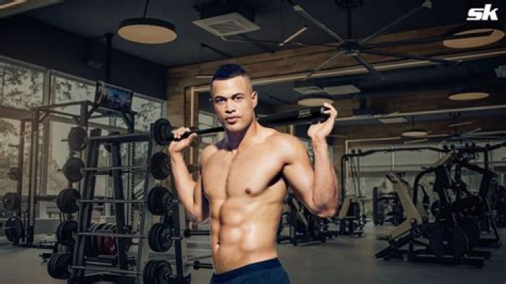 Giancarlo Stanton's muscle-building secrets include crushing curls with massive dumbbells
