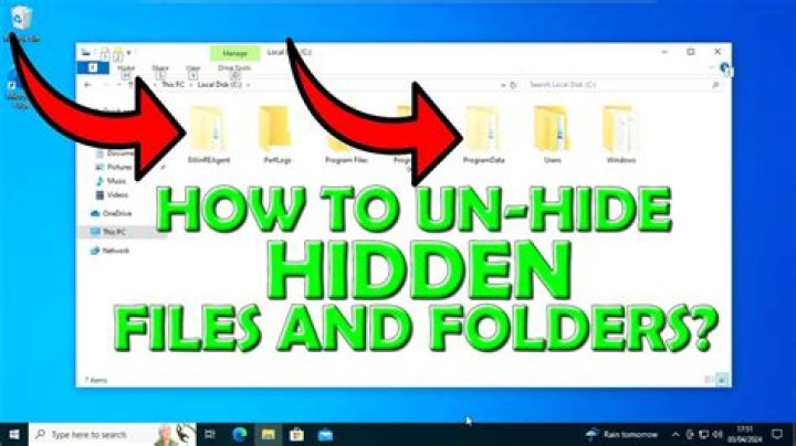 How can I unhide hidden files in Windows XP?